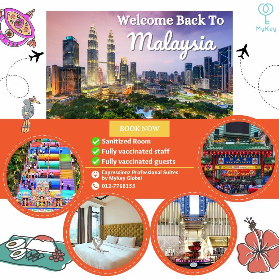 Expressionz Professional Suites By Mykey Kuala Lumpur Eksteriør bilde A poster advertising the reopening of Malaysia's borders to tourists.